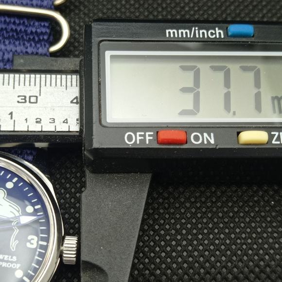 Vintage 1986 Oris Disney Manual Mens Silver Watch W/Cloth Strap & Mickey accents - Picture 7 of 8